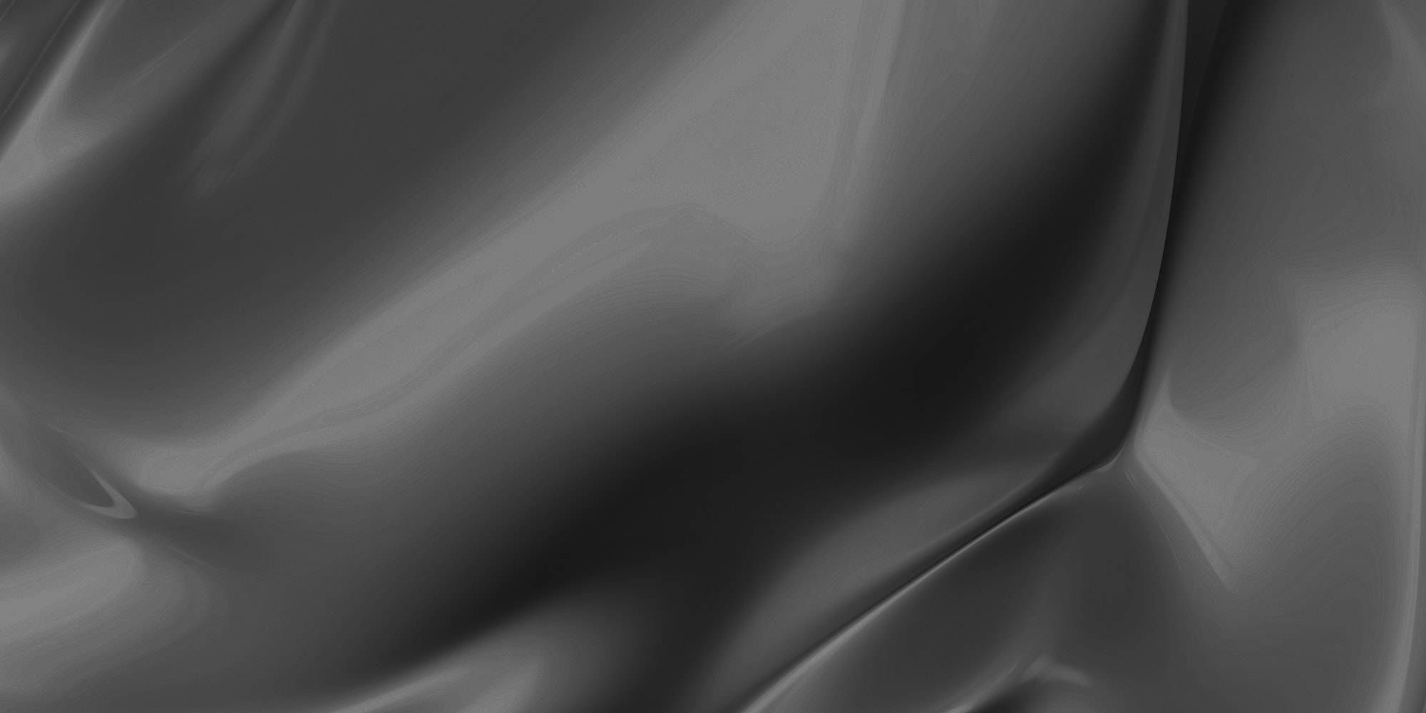 Smooth black fabric with soft, flowing texture.