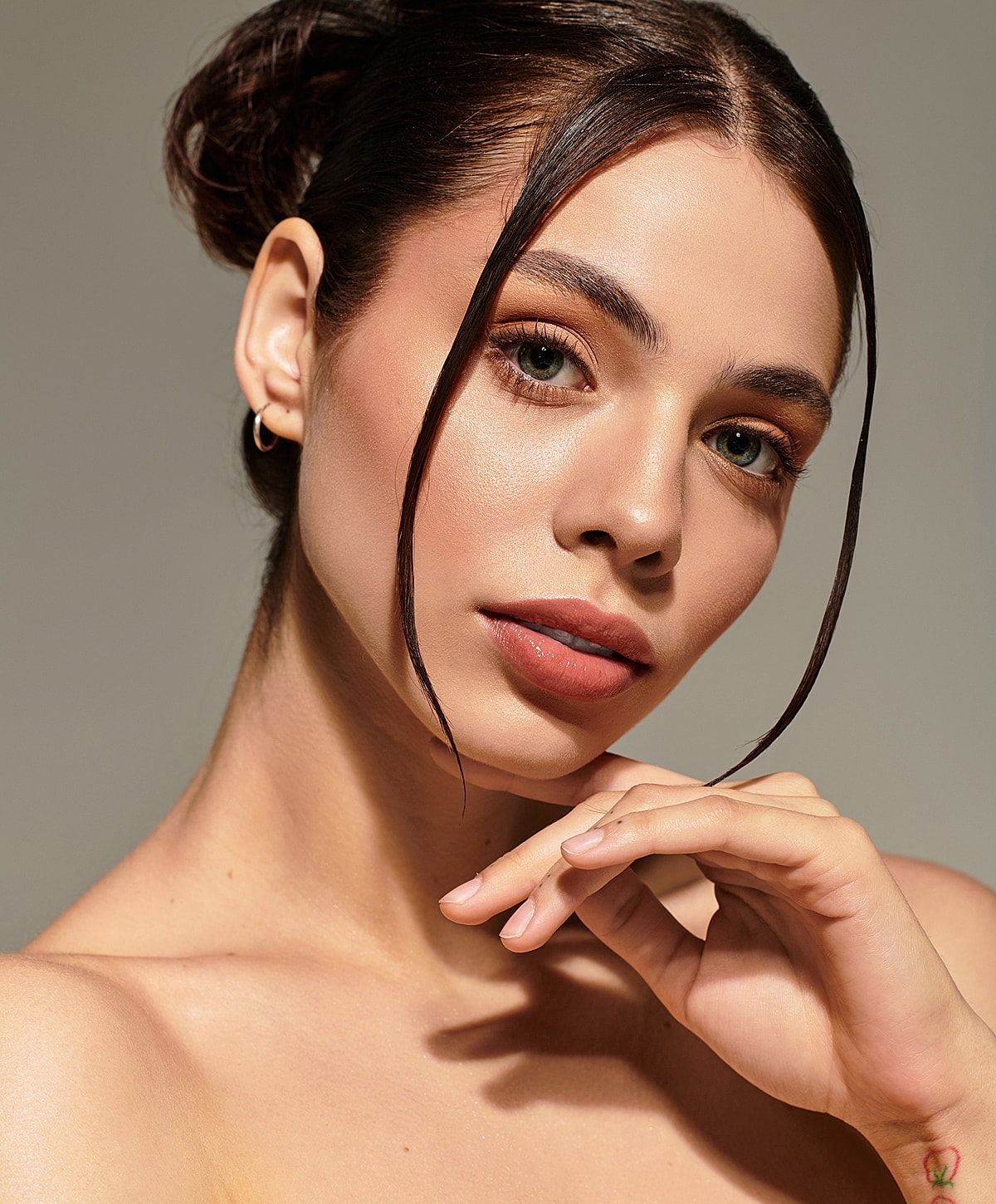 Close-up portrait of a woman with elegant features.