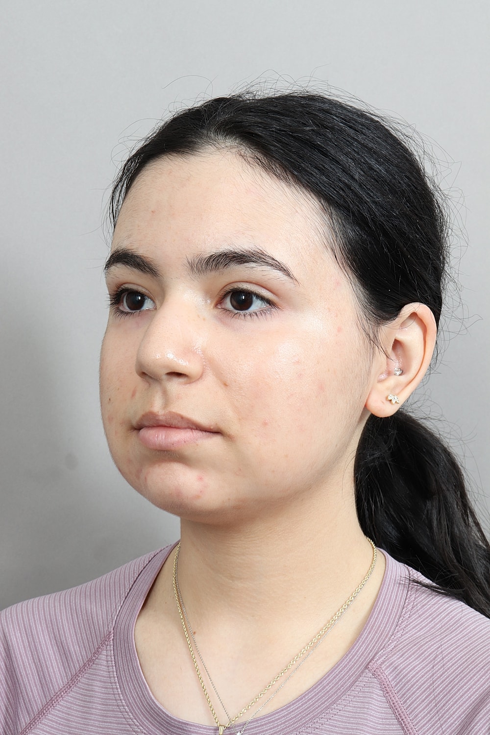 Profile view of a woman’s face.